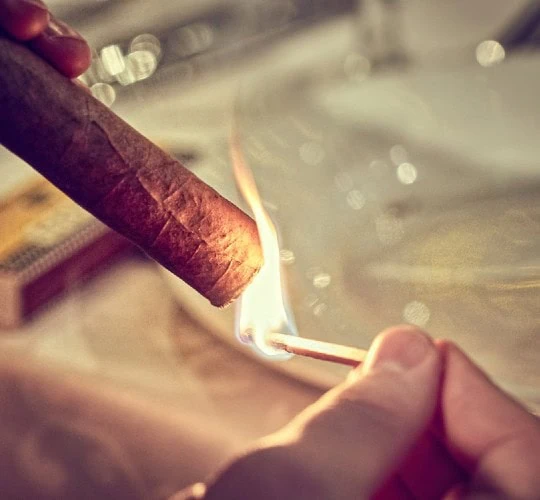 the myths lighting cigar with flame